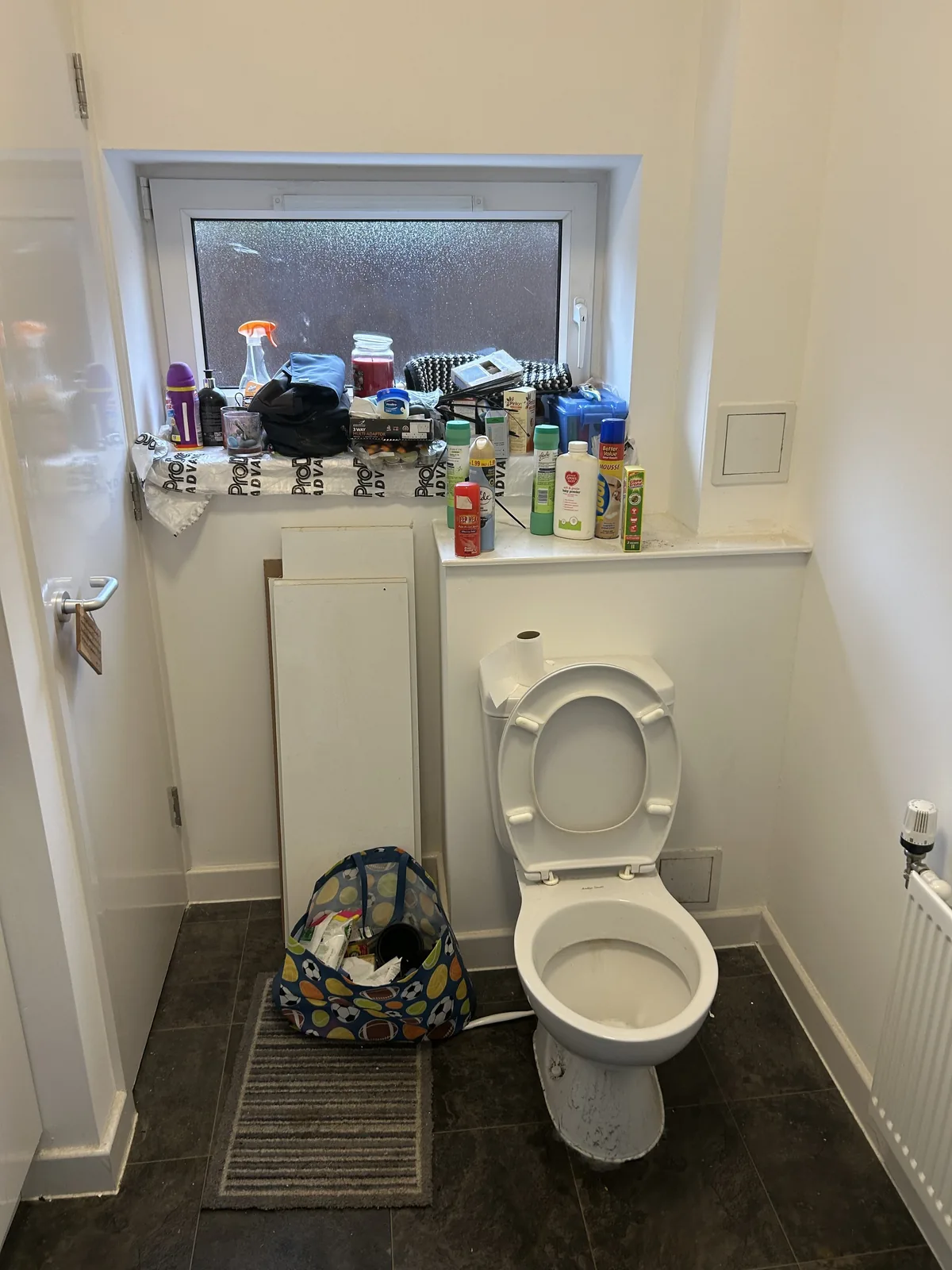 Bathroom before cleaning by HomeGlow Cleaning Services